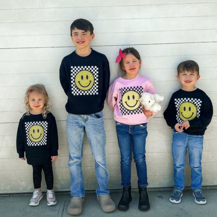 Big Yellow Checker Smiley (Front) w/ I am Strong Smart Kind Brave Bold (Back) - Child Sweater