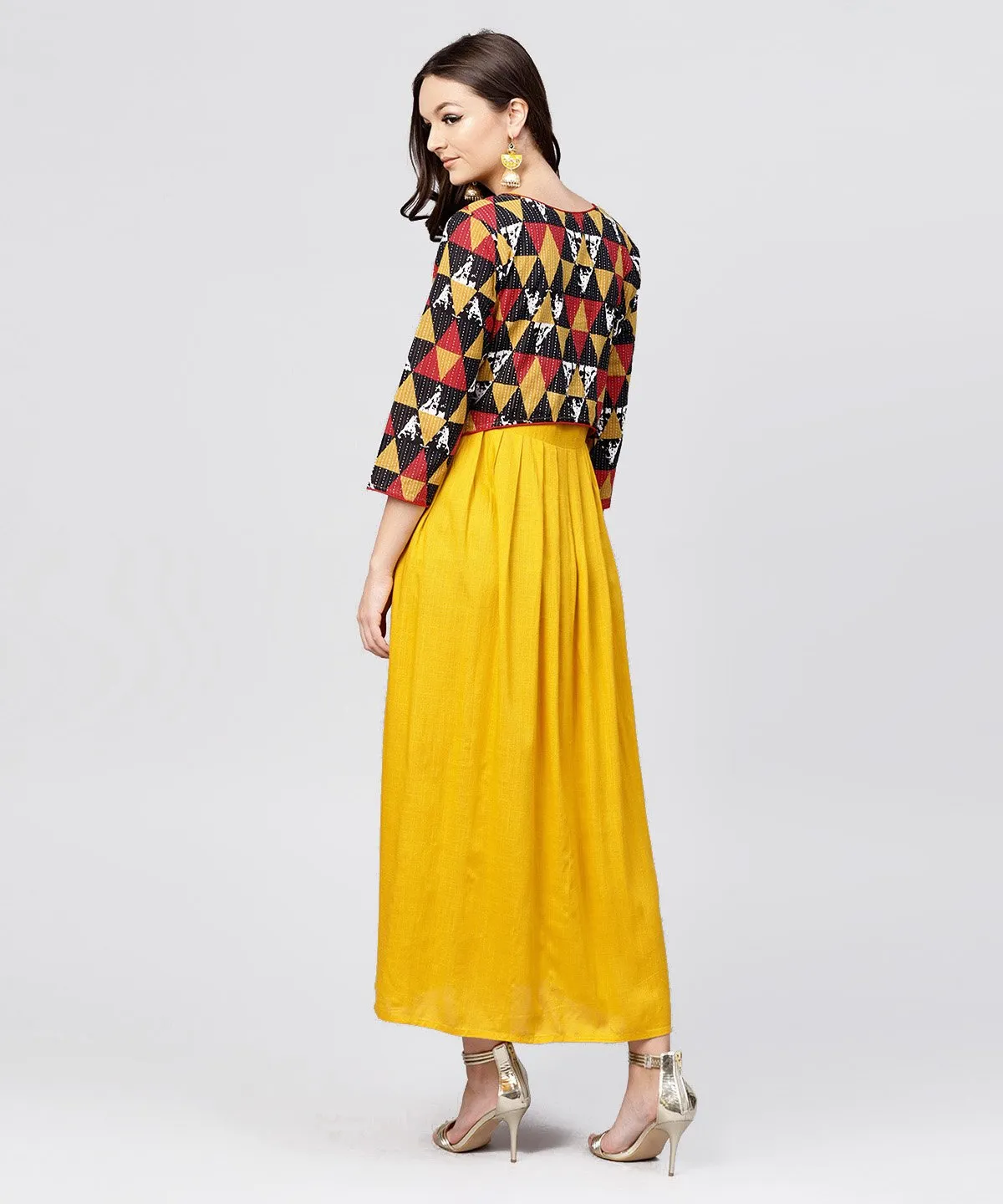 Bright Yellow Rayon A-Line Box Pleated Maxi With Attached Jacket Till Yoke And Emblished With Tassels