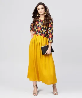 Bright Yellow Rayon A-Line Box Pleated Maxi With Attached Jacket Till Yoke And Emblished With Tassels