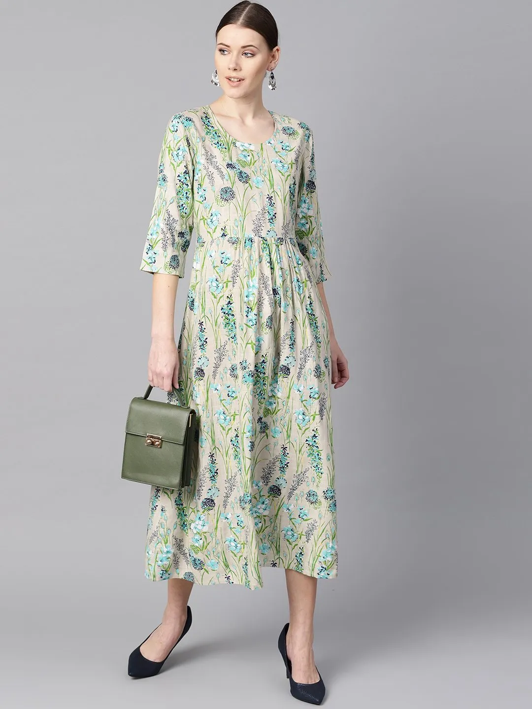 Floral Print Dress With Gathers In Centre With A Belt At The Back