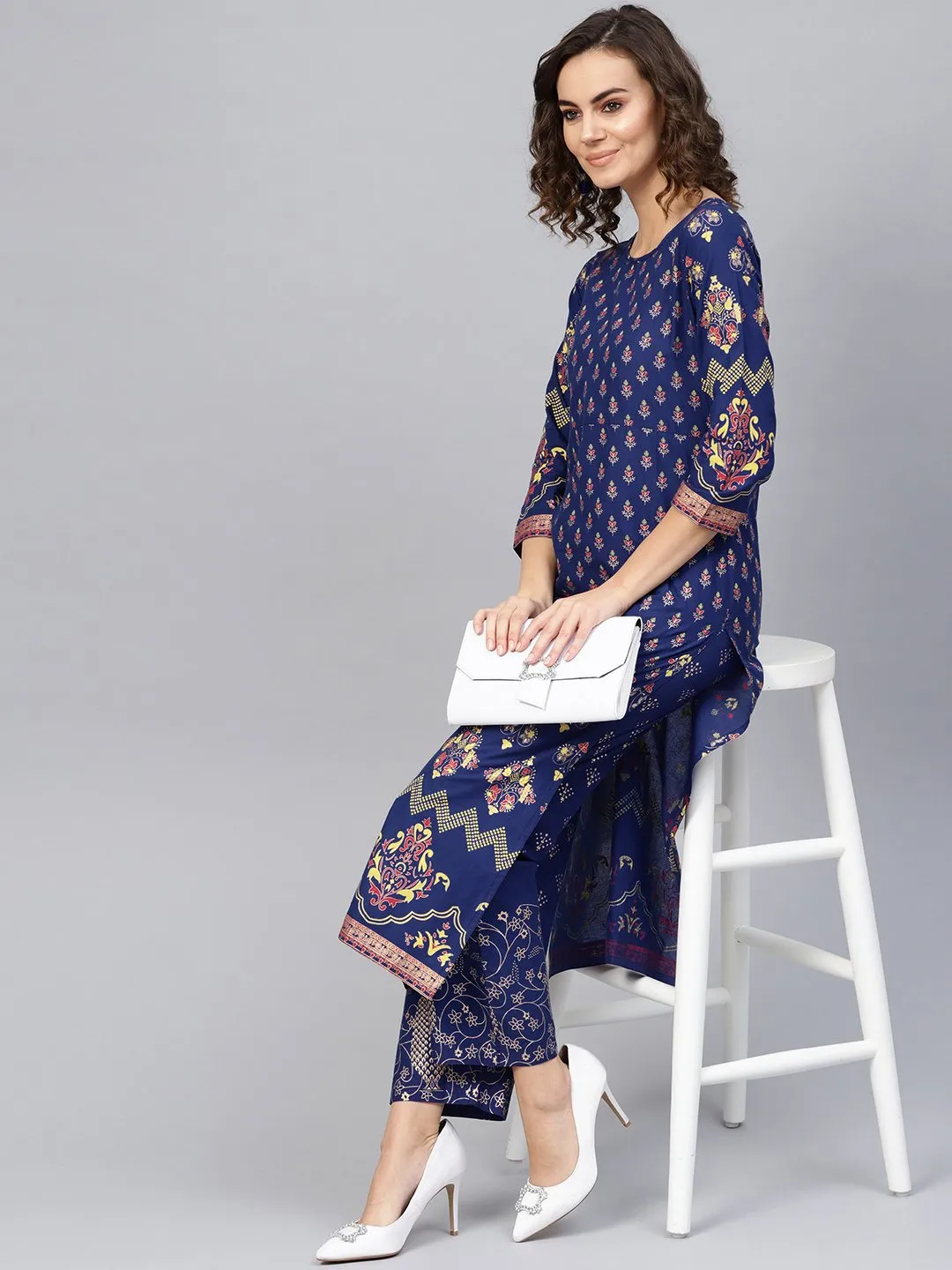 Women Blue & Golden Printed Kurta With Trousers